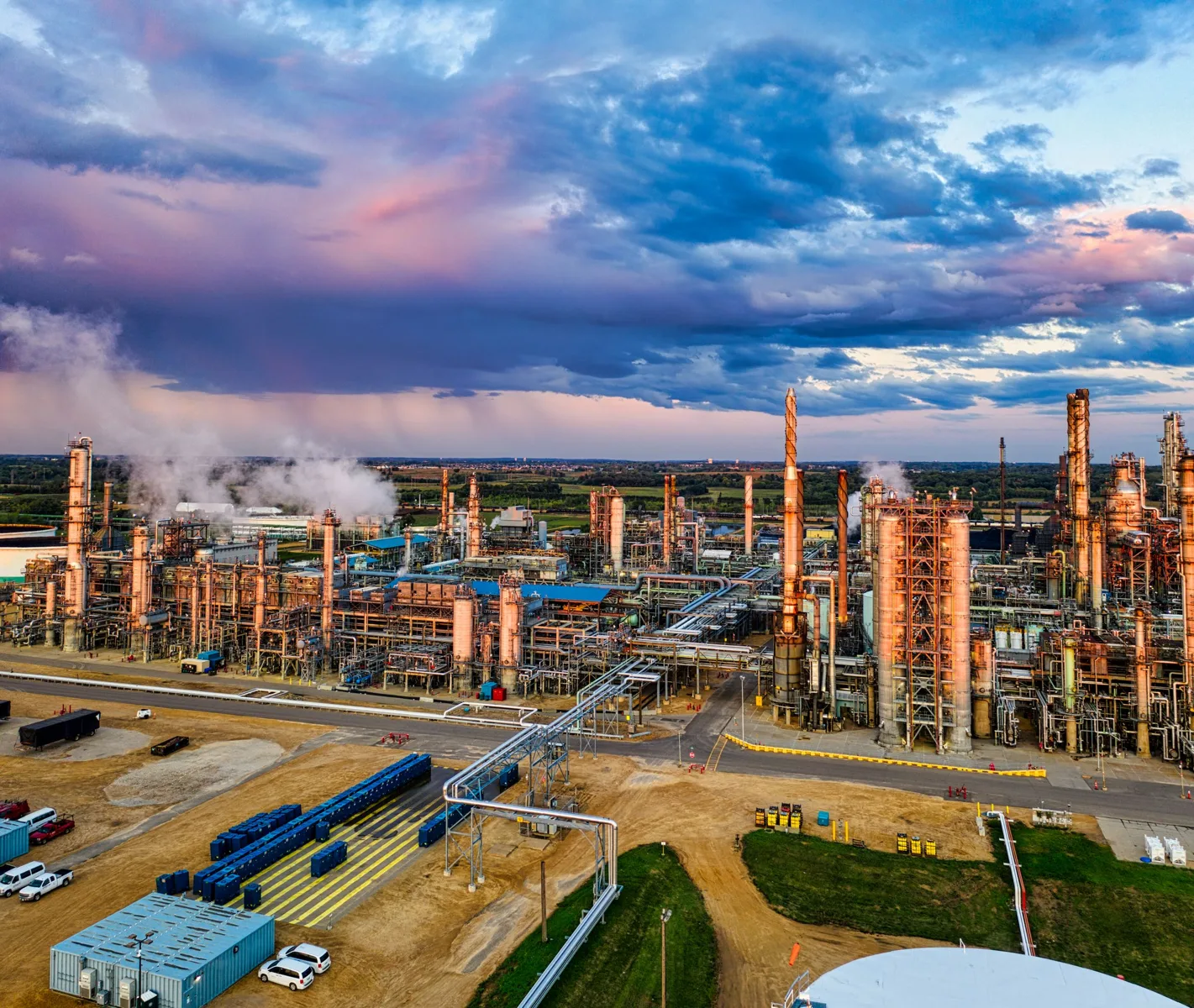 Illustrative photograph of refinery process towers and pipework